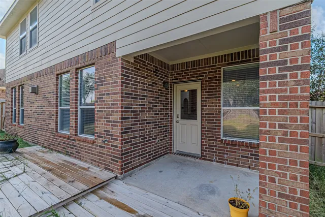 a house view with a outdoor space