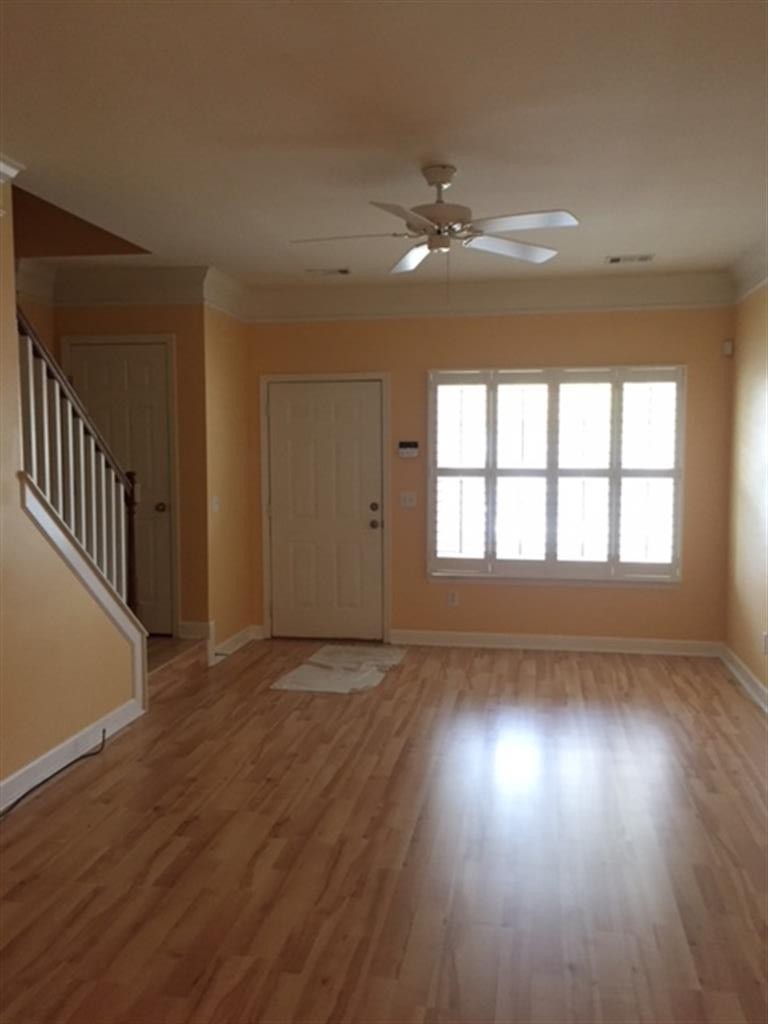 3535 Bell Road, Unit 405 Nashville, TN 37214 - Photo 2 of 11 wooden floor in an empty room with a window