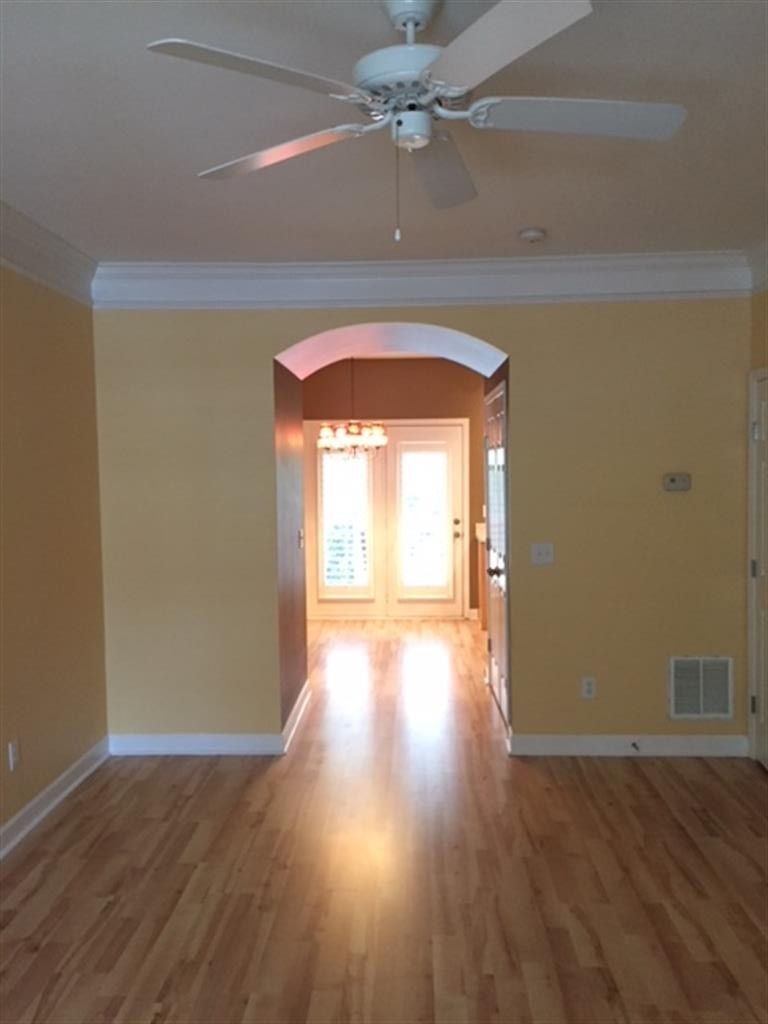 3535 Bell Road, Unit 405 Nashville, TN 37214 - Photo 3 of 11 a view of empty room with wooden floor and fan