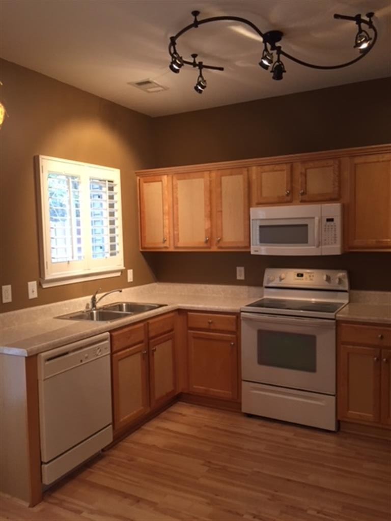 3535 Bell Road, Unit 405 Nashville, TN 37214 - Photo 4 of 11 a kitchen with a stove sink and microwave