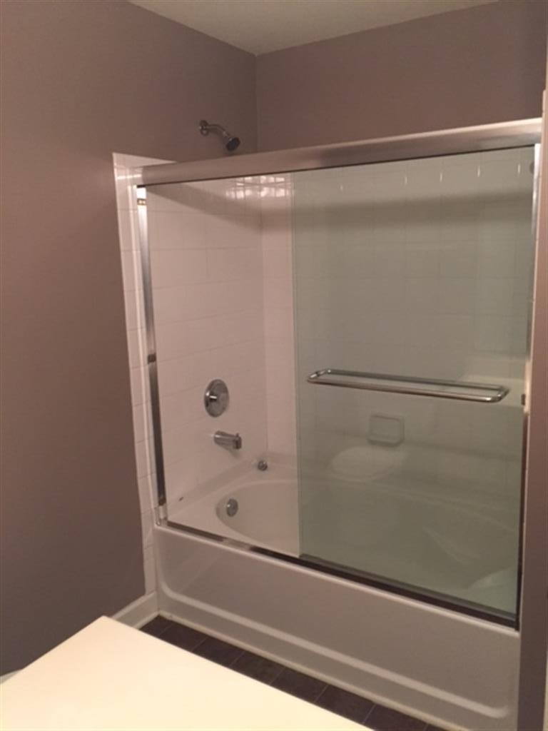 3535 Bell Road, Unit 405 Nashville, TN 37214 - Photo 9 of 11 a bathroom with a bathtub