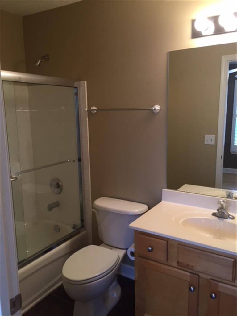 3535 Bell Road, Unit 405 Nashville, TN 37214 - Photo 10 of 11 a bathroom with a sink toilet and shower