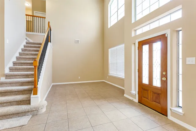 a view of an entryway with staircase