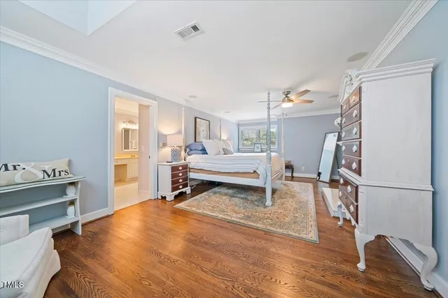 a bedroom with a bed and furniture