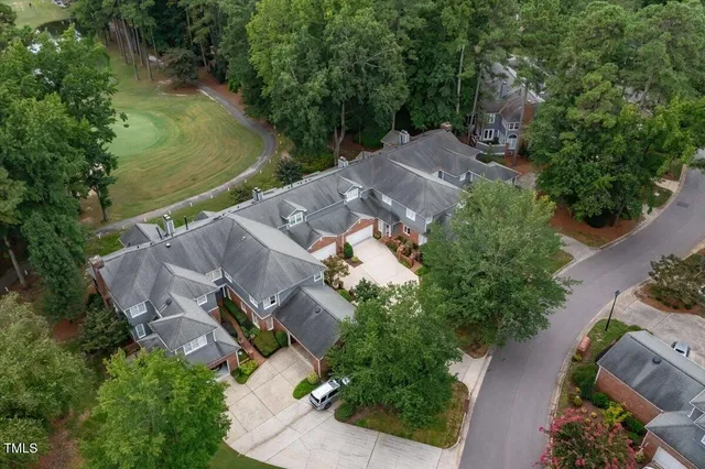 an aerial view of a house with mountain view
