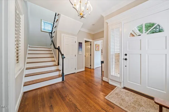 a view of entryway with wooden floor