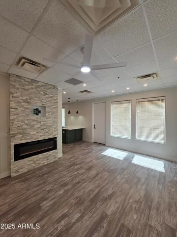 a view of an empty room with a window