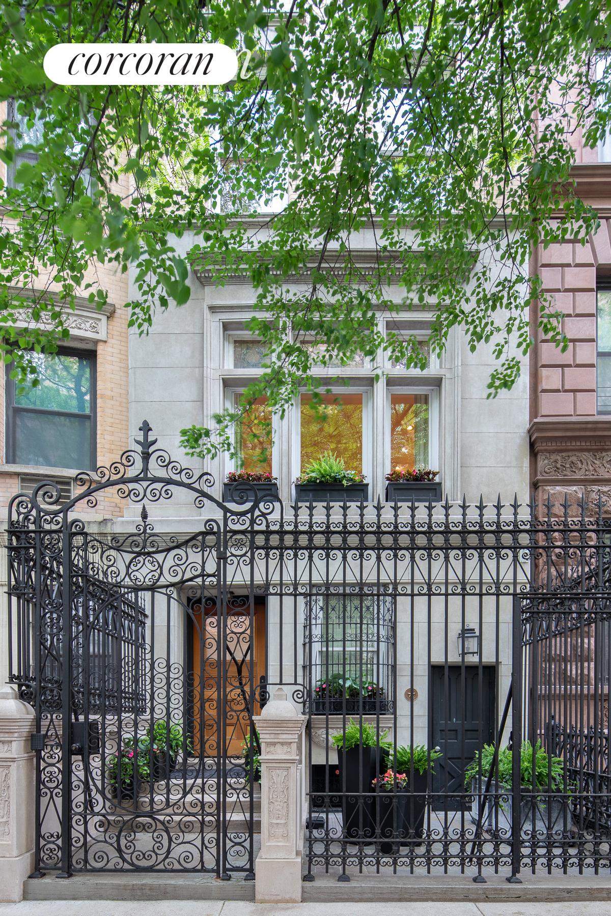 a view of a chairs and table in backyard