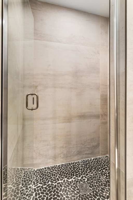 41 Wolcott Street, Unit 4 Everett, MA 02149 - Photo 16 of 19 a bathroom with a shower