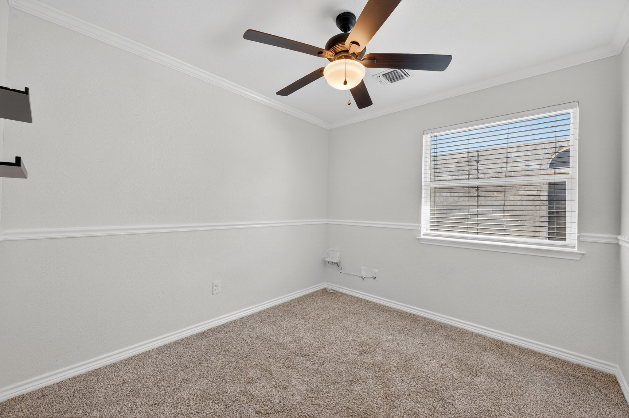 1201 Dillon Lake Bend Leander, TX 78641 - Photo 22 of 38 Bedroom with carpet floors, a ceiling fan, and crown molding