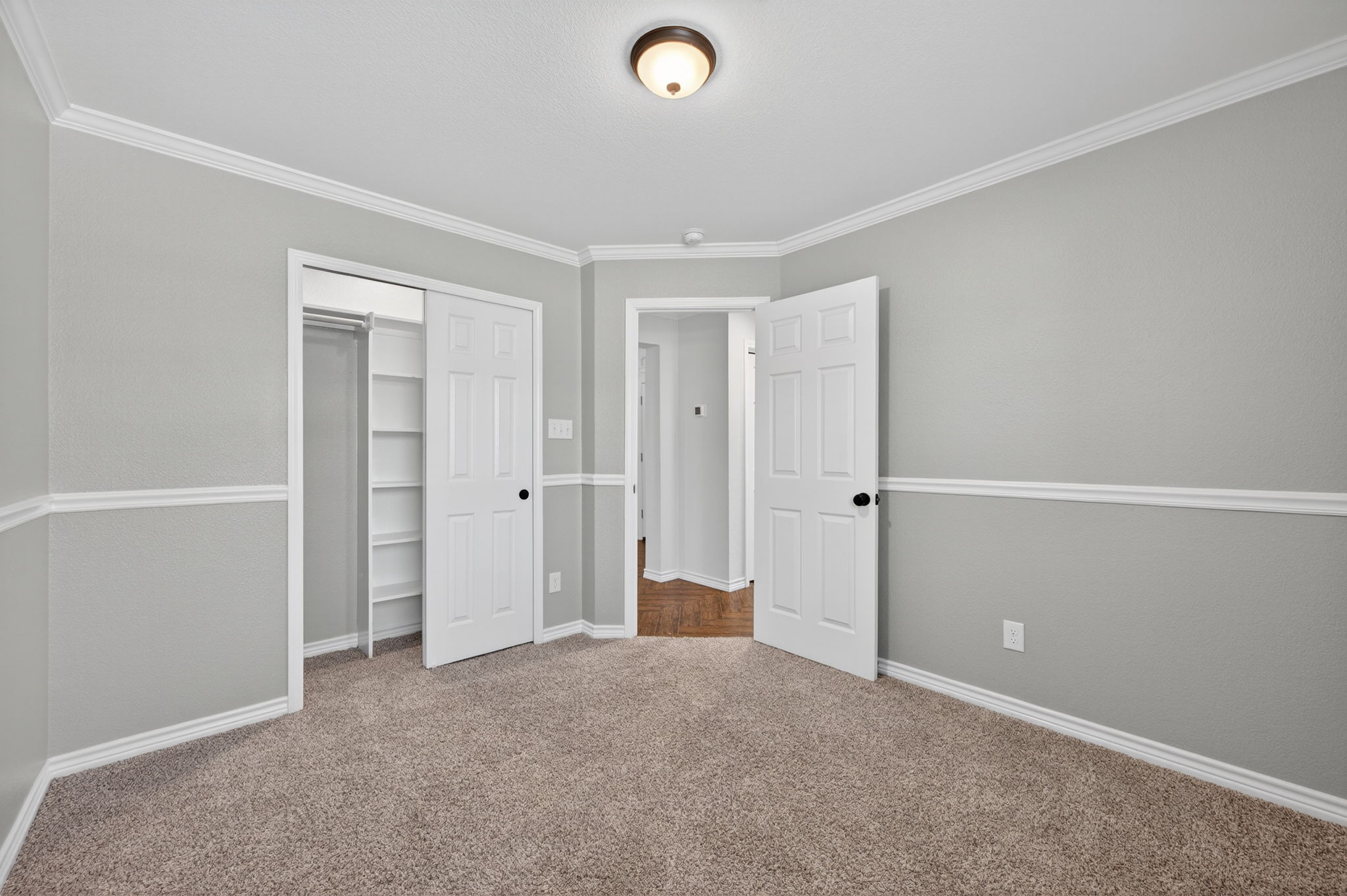 1201 Dillon Lake Bend Leander, TX 78641 - Photo 24 of 38 Bedroom with a closet, carpet, and ornamental molding