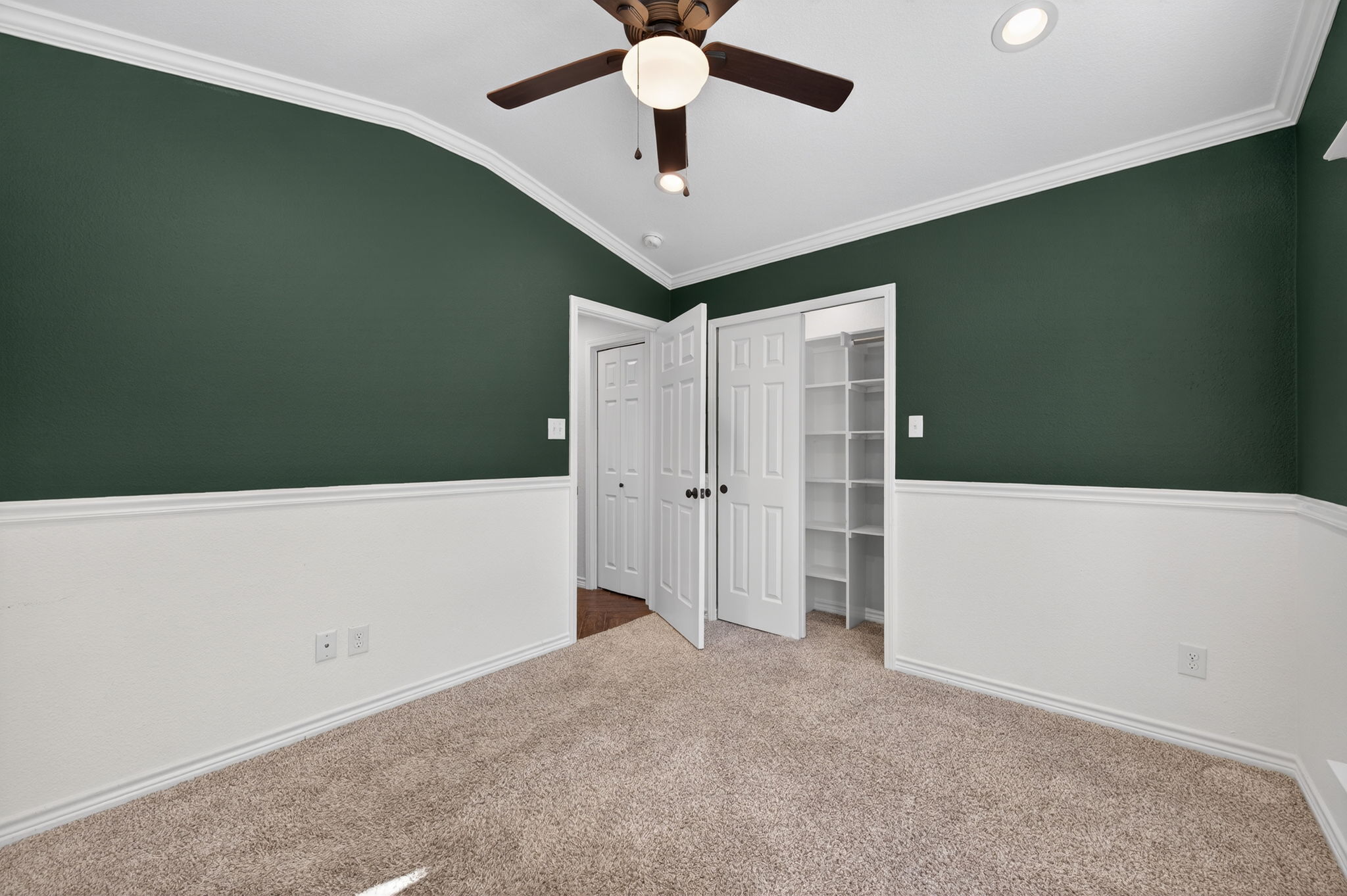 1201 Dillon Lake Bend Leander, TX 78641 - Photo 28 of 38 Bedroom with ornamental molding, carpet, ceiling fan, vaulted ceiling, and a closet