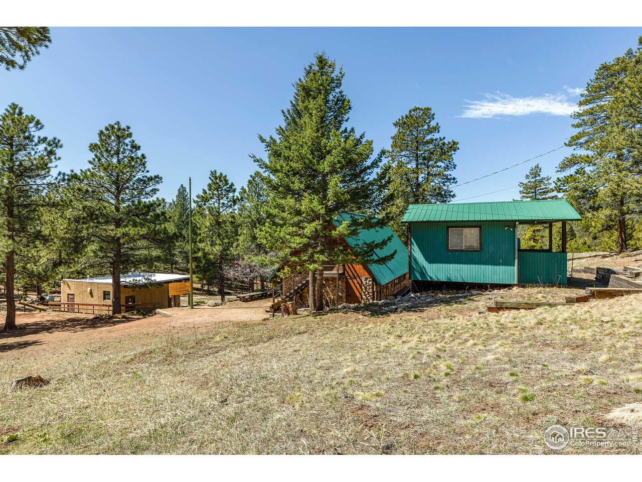 7022 Flagstaff Road Boulder, CO 80302 - Photo 7 of 8 a view of a house with a tree