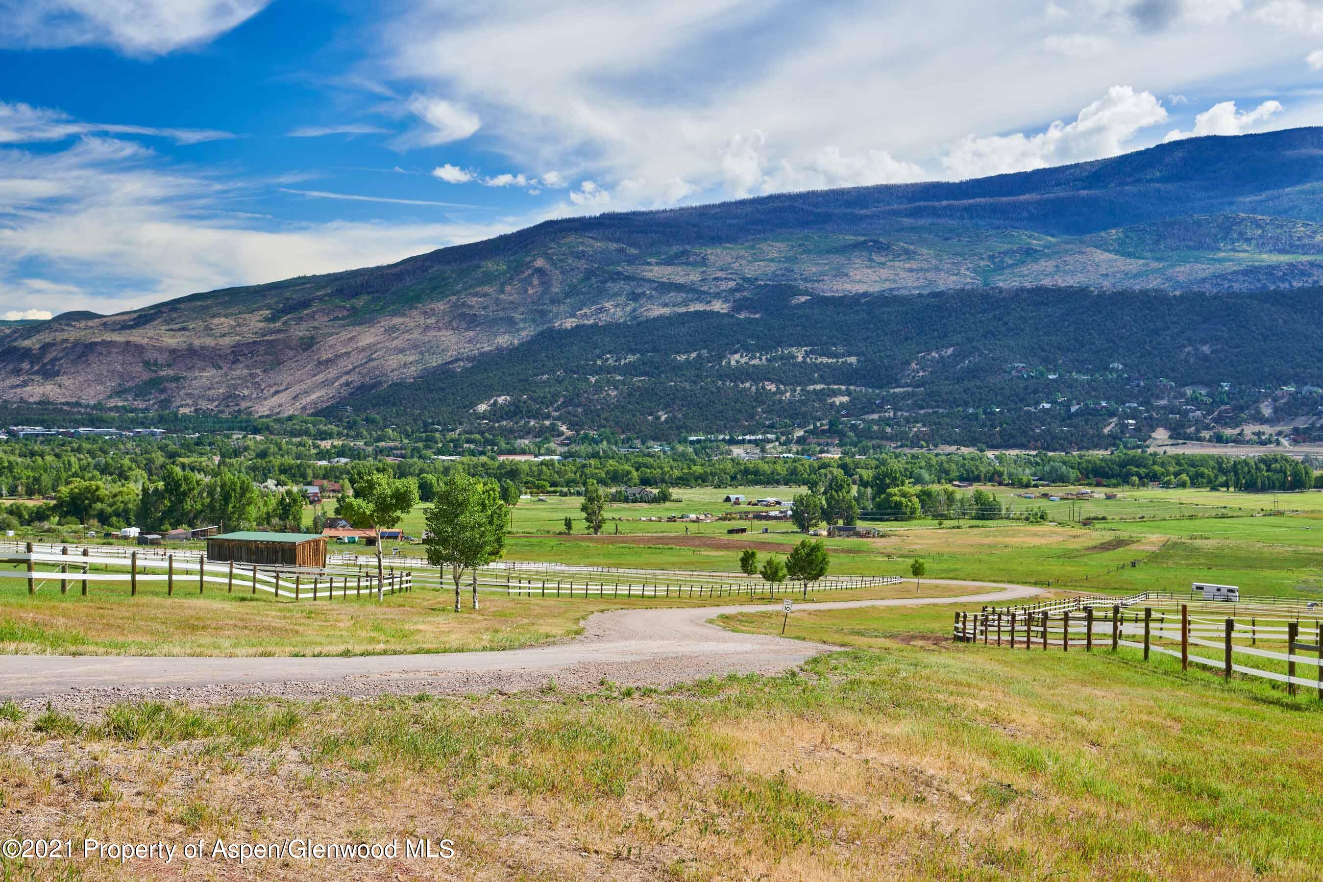 403 Lester Lane Basalt, CO 81621 - Photo 18 of 31 a view of a swimming pool with a yard