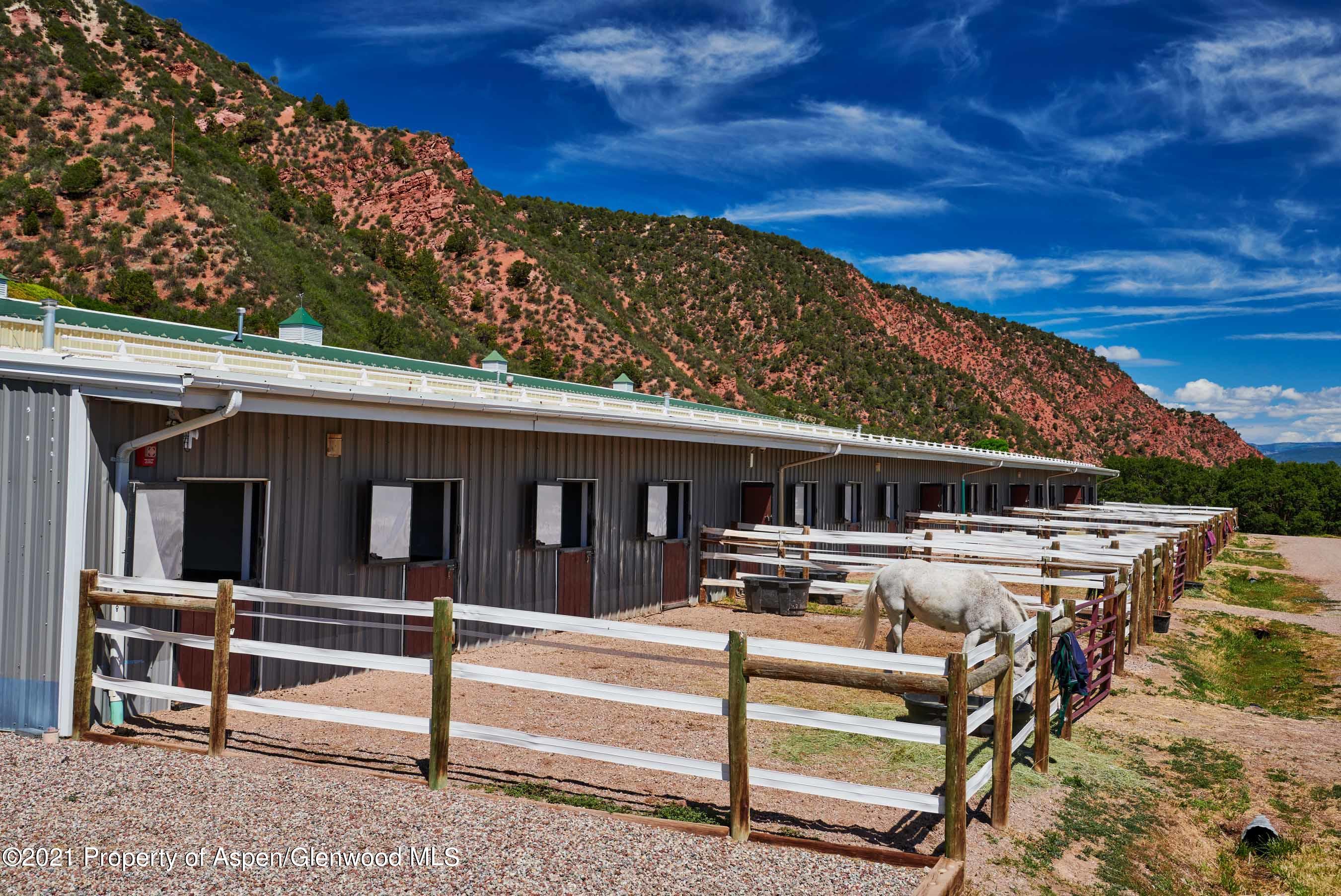 403 Lester Lane Basalt, CO 81621 - Photo 6 of 31 a view of a house with wooden floor and a fence