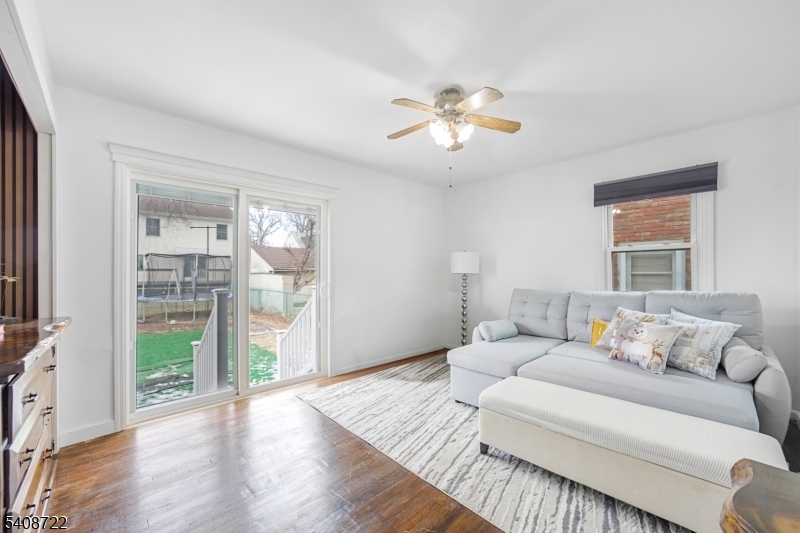 119 East 13th Street Linden, NJ 07036 - Photo 14 of 22 a living room with furniture and a large window