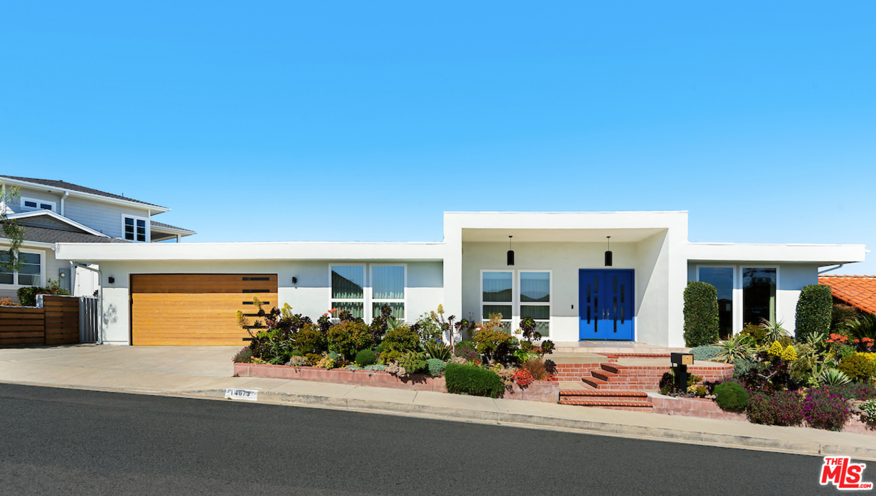 a view of a house with a patio