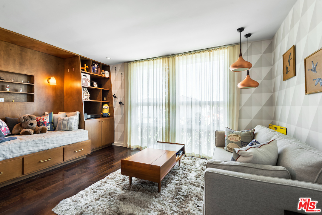 14673 Deervale Place Sherman Oaks, CA 91403 - Photo 12 of 25 a living room with furniture and a window