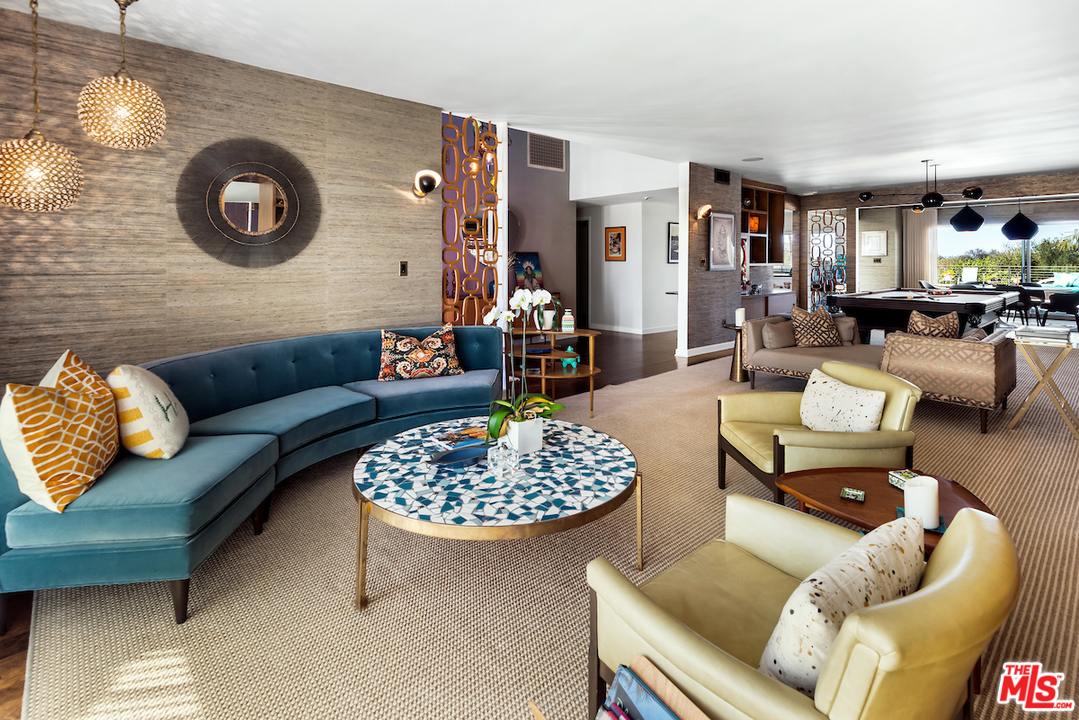 14673 Deervale Place Sherman Oaks, CA 91403 - Photo 4 of 25 a living room with furniture and a table