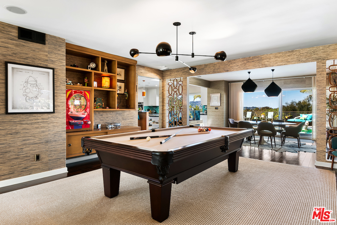 14673 Deervale Place Sherman Oaks, CA 91403 - Photo 5 of 25 a room with furniture pool table and outdoor view