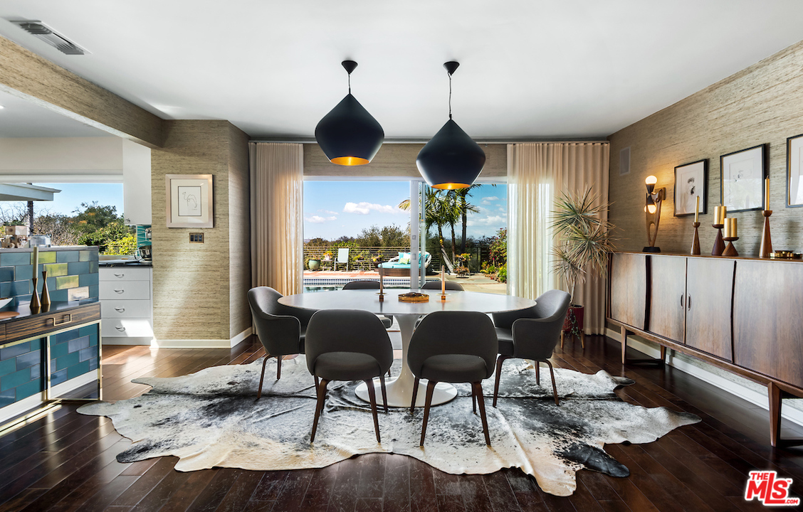 14673 Deervale Place Sherman Oaks, CA 91403 - Photo 6 of 25 a view of a dining room with furniture window and wooden floor