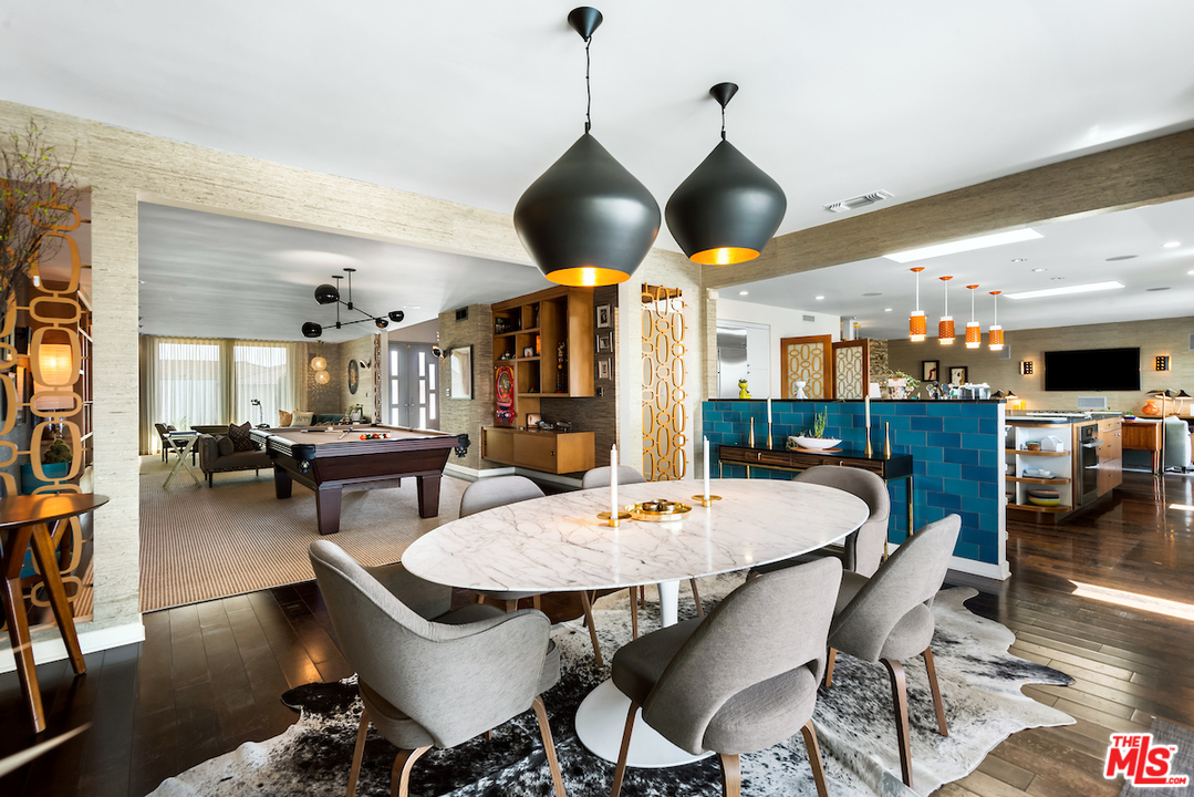 14673 Deervale Place Sherman Oaks, CA 91403 - Photo 7 of 25 a dining room with furniture and wooden floor