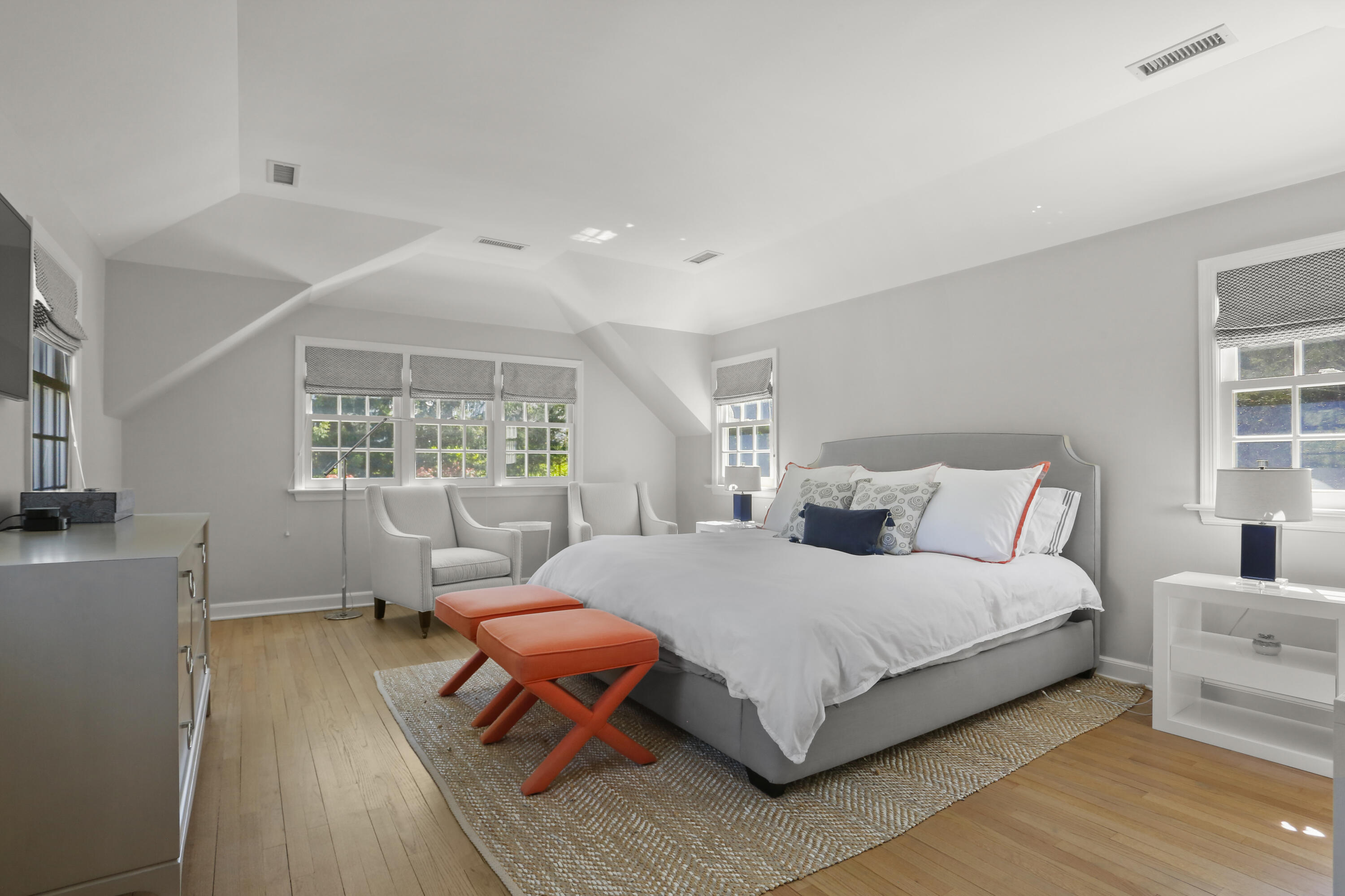 10 Saddle Ridge Road Darien, CT 06820 - Photo 13 of 41 a bedroom with a bed and wooden floor