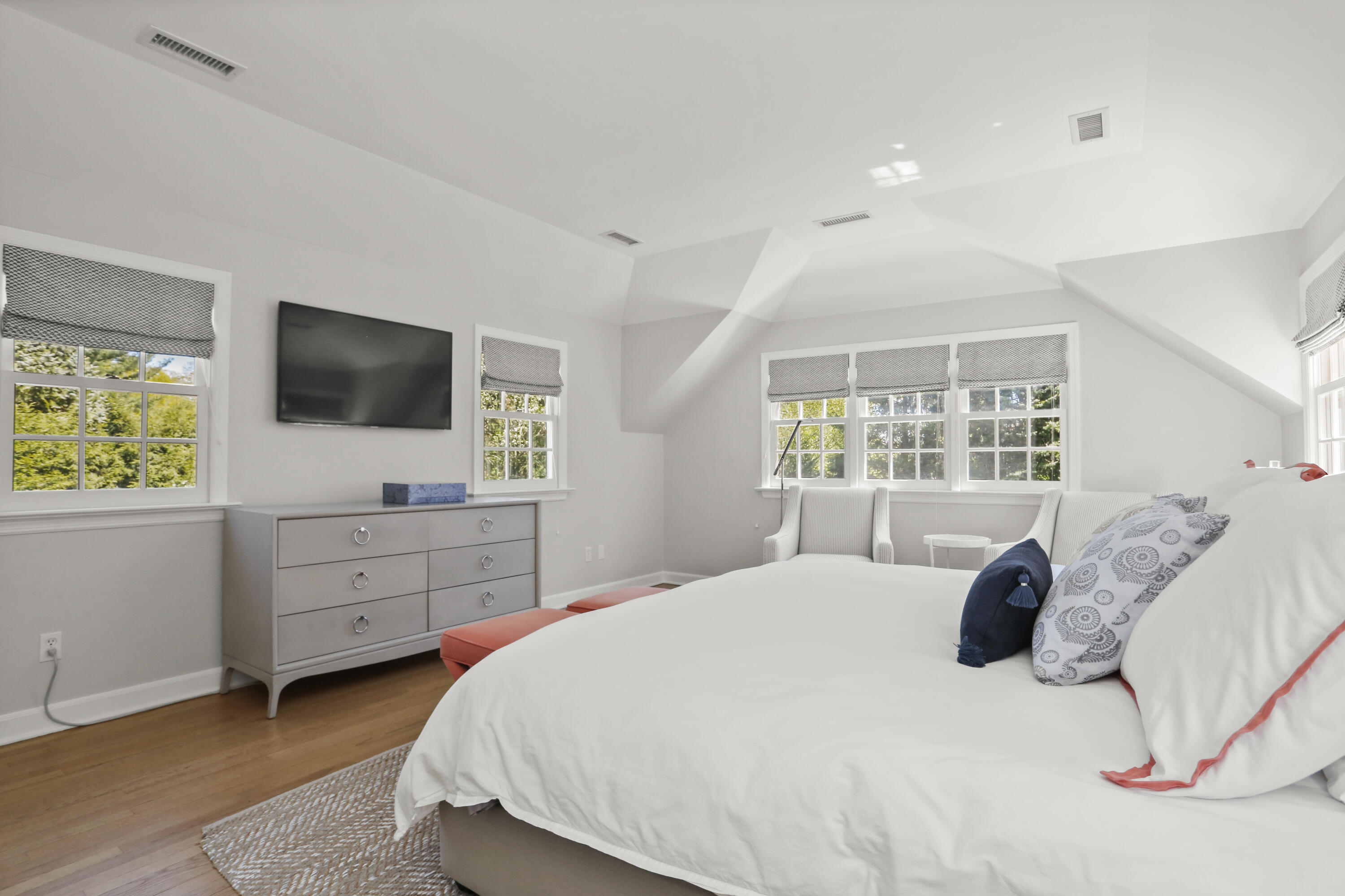 10 Saddle Ridge Road Darien, CT 06820 - Photo 14 of 41 a bedroom with a bed and a flat screen tv