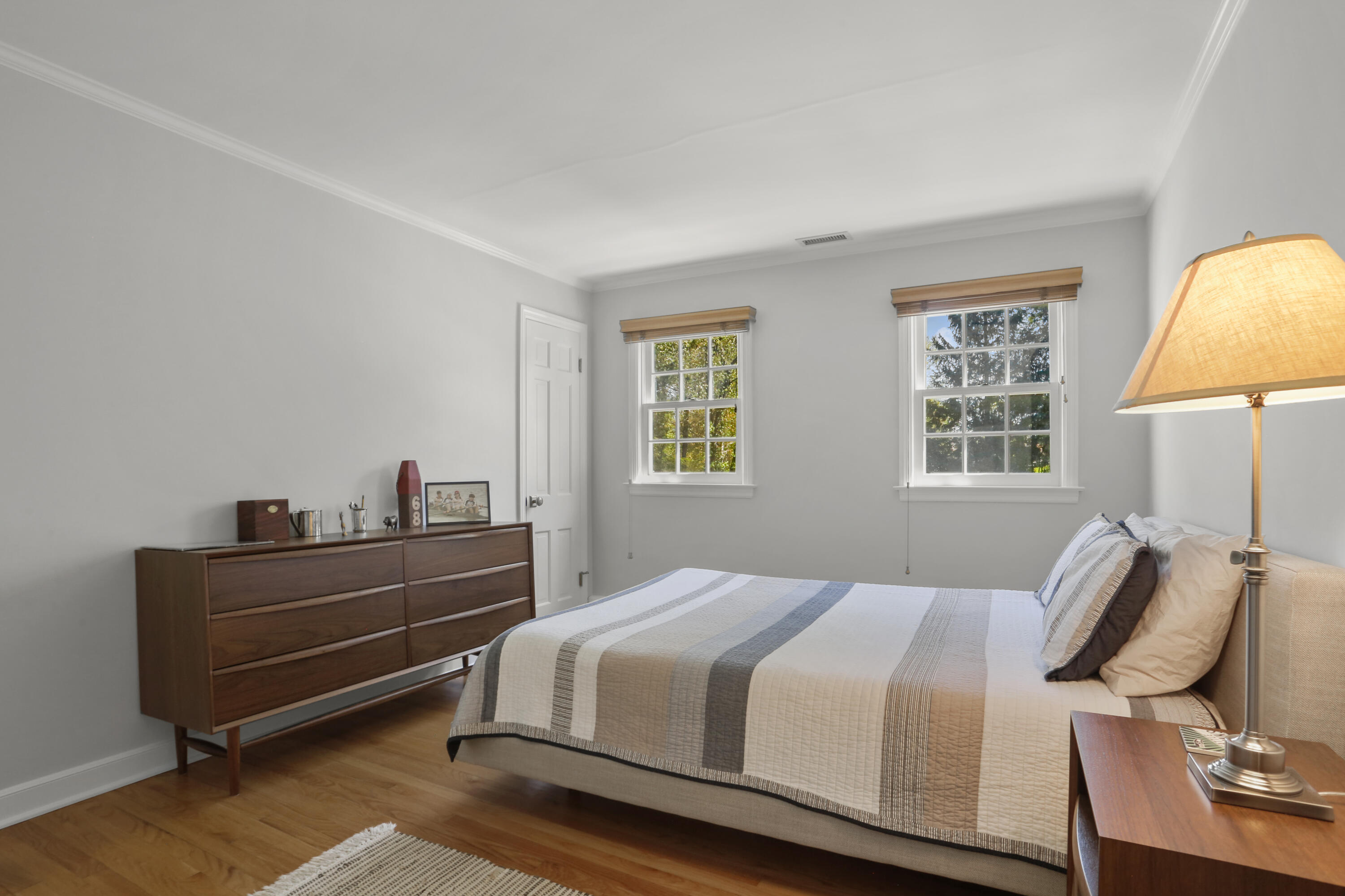 10 Saddle Ridge Road Darien, CT 06820 - Photo 19 of 41 a bedroom with a bed and window