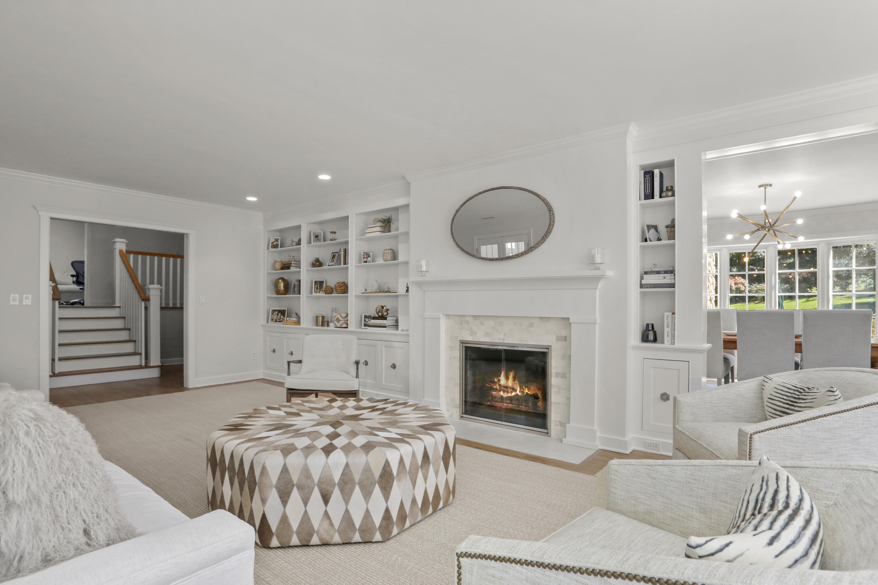 10 Saddle Ridge Road Darien, CT 06820 - Photo 2 of 41 a living room with furniture and a fireplace