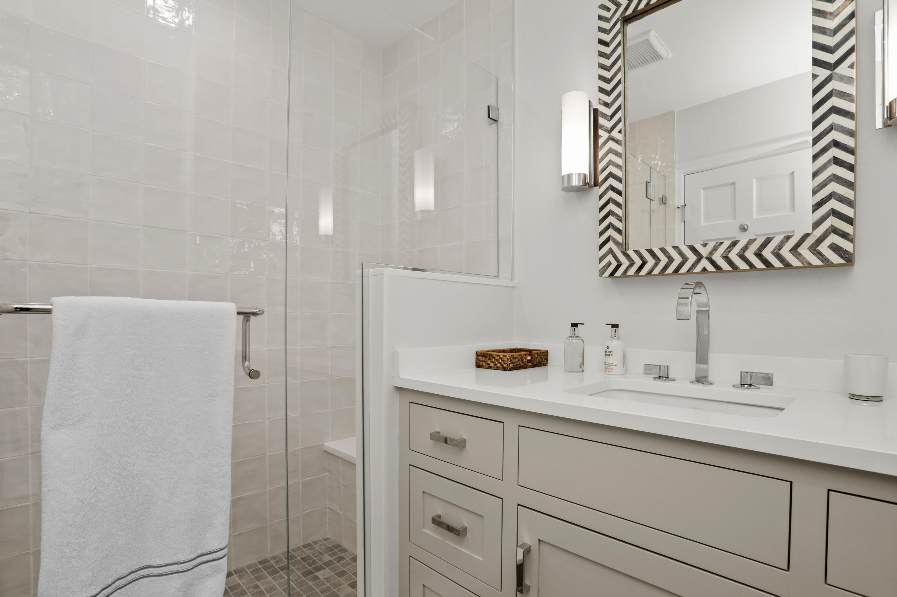10 Saddle Ridge Road Darien, CT 06820 - Photo 22 of 41 a bathroom with a sink and a mirror