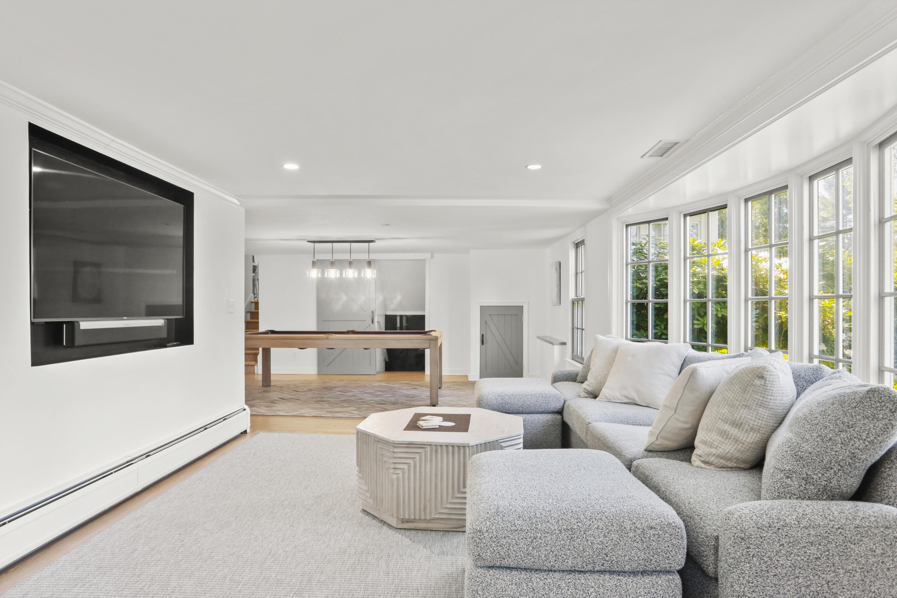 10 Saddle Ridge Road Darien, CT 06820 - Photo 29 of 41 a living room with furniture and large windows