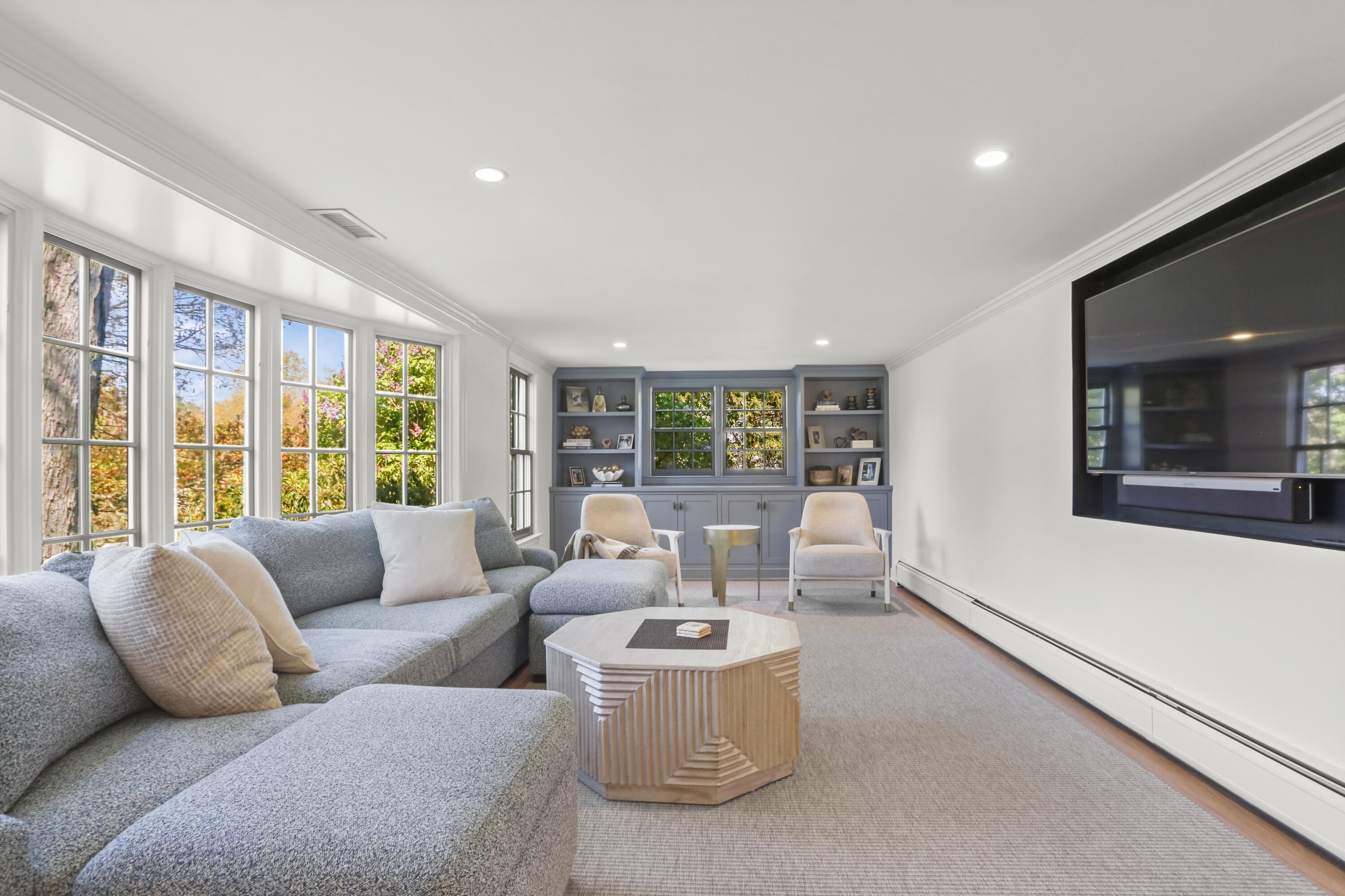 10 Saddle Ridge Road Darien, CT 06820 - Photo 30 of 41 a living room with furniture and a large window