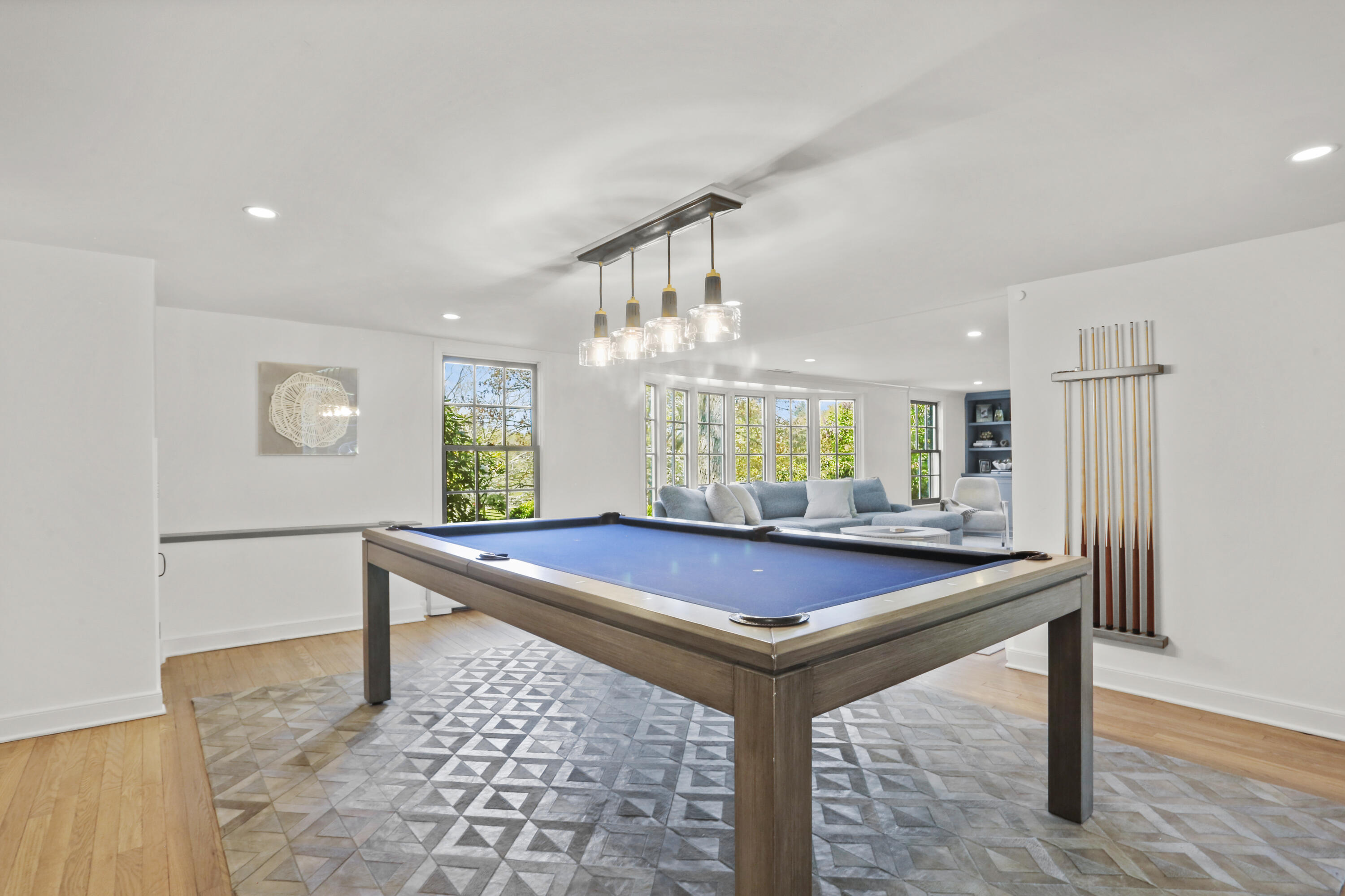 10 Saddle Ridge Road Darien, CT 06820 - Photo 31 of 41 a room with table chairs and wooden floor