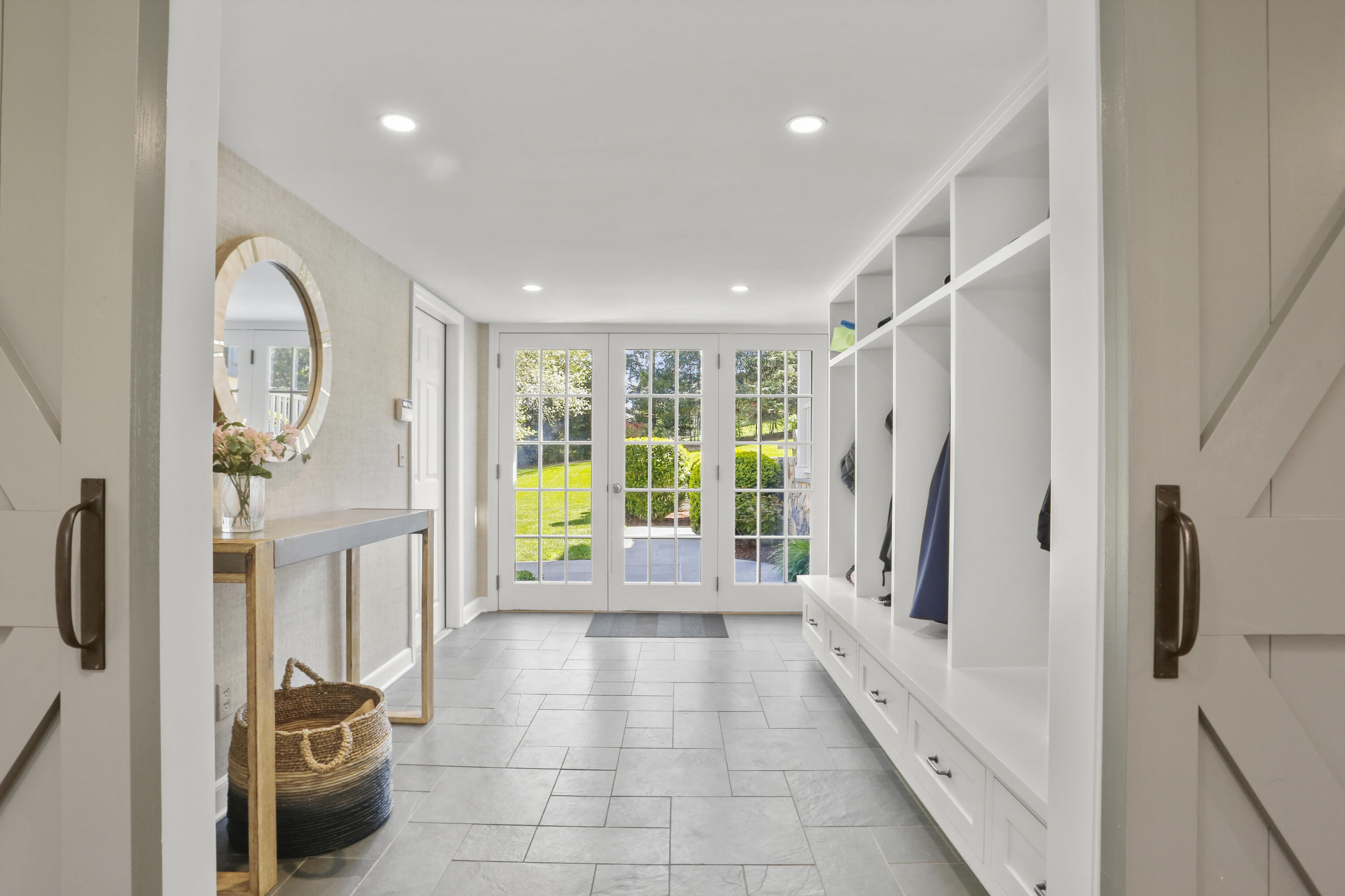 10 Saddle Ridge Road Darien, CT 06820 - Photo 32 of 41 a bathroom with a tub shower and a sink