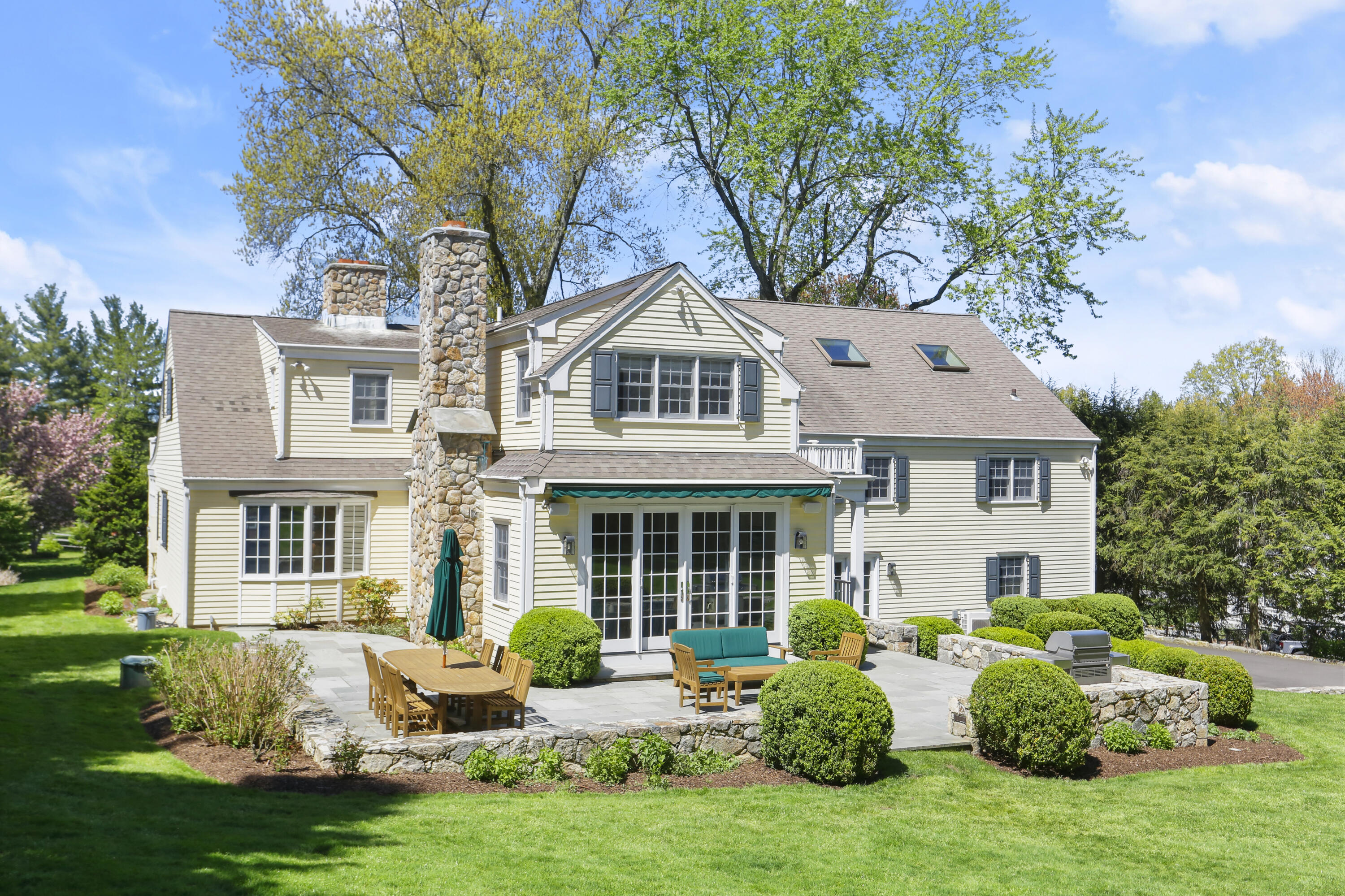 10 Saddle Ridge Road Darien, CT 06820 - Photo 34 of 41 a front view of house with yard and green space