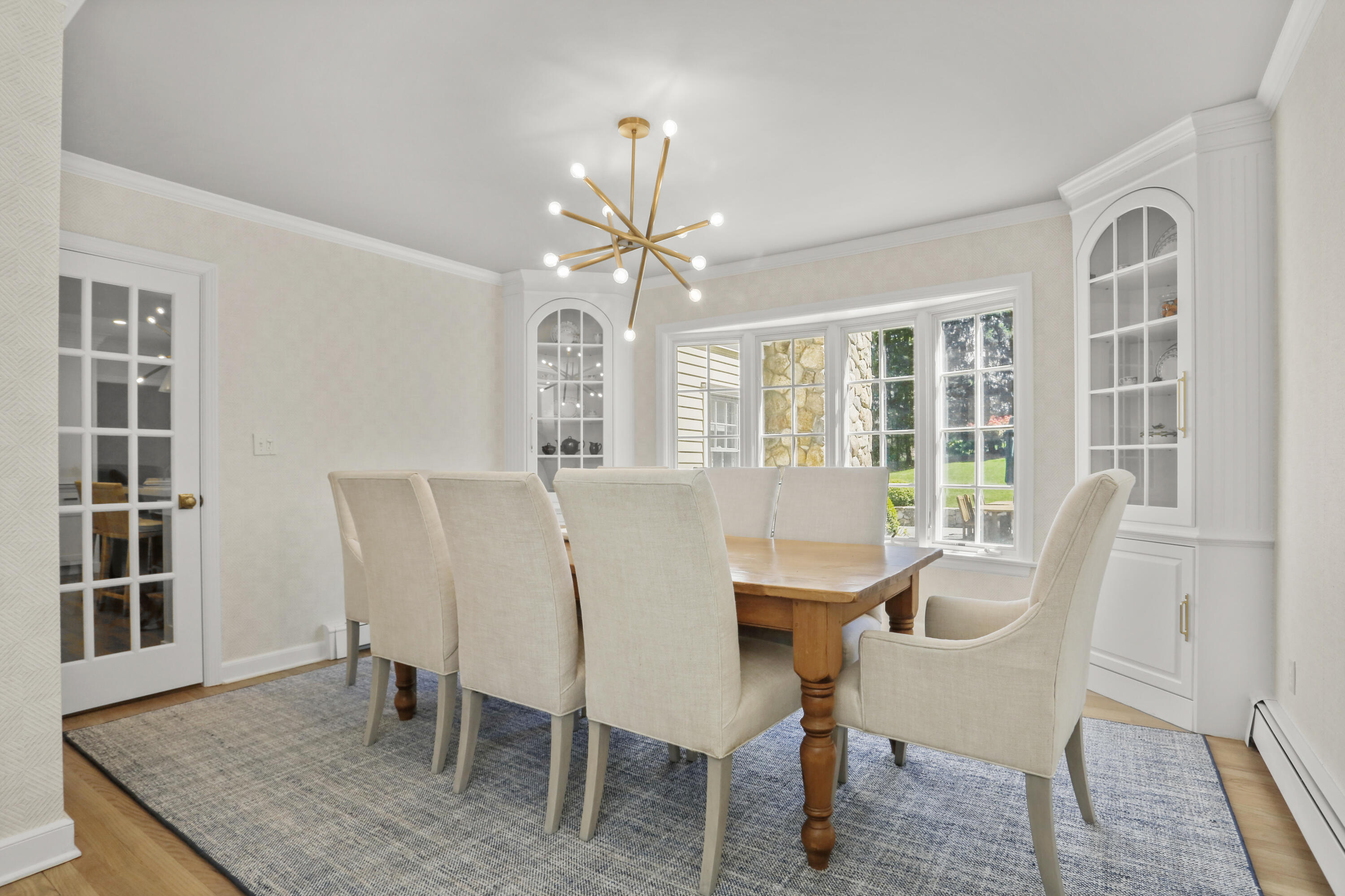 10 Saddle Ridge Road Darien, CT 06820 - Photo 5 of 41 a view of a dining room with furniture window and outside view