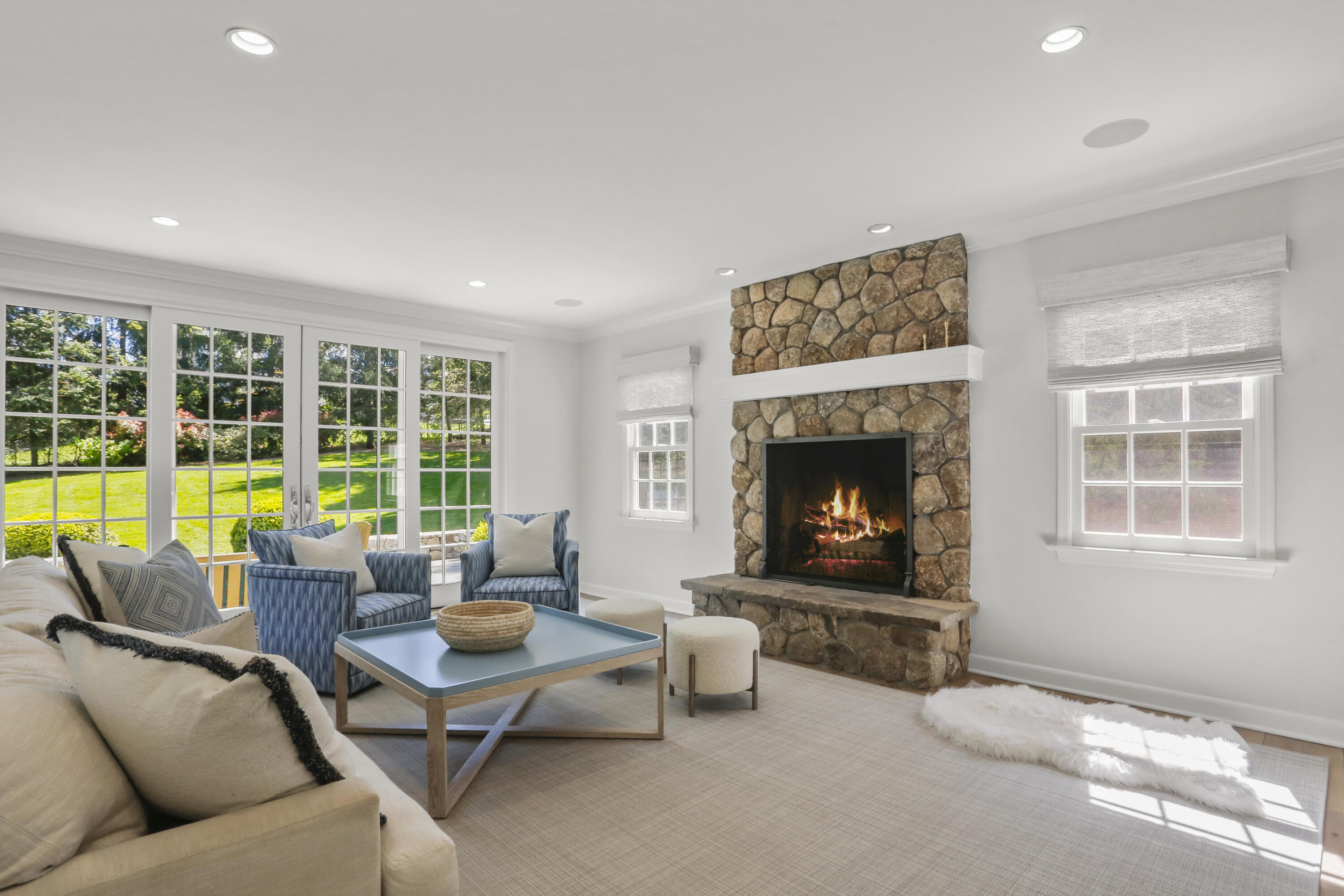 10 Saddle Ridge Road Darien, CT 06820 - Photo 7 of 41 a living room with furniture and a fireplace