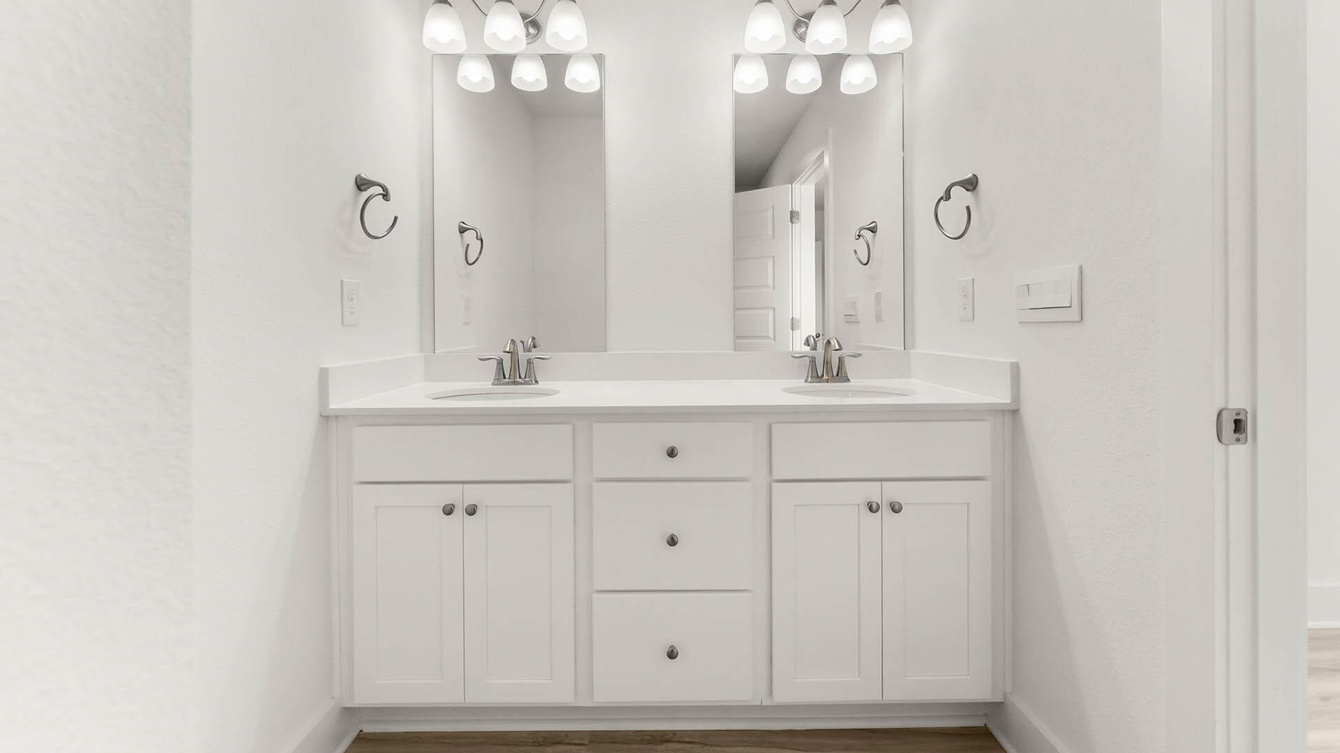 137 Hawk Street Santa Rosa Beach, FL 32459 - Photo 19 of 30 a bathroom with a sink vanity and mirror