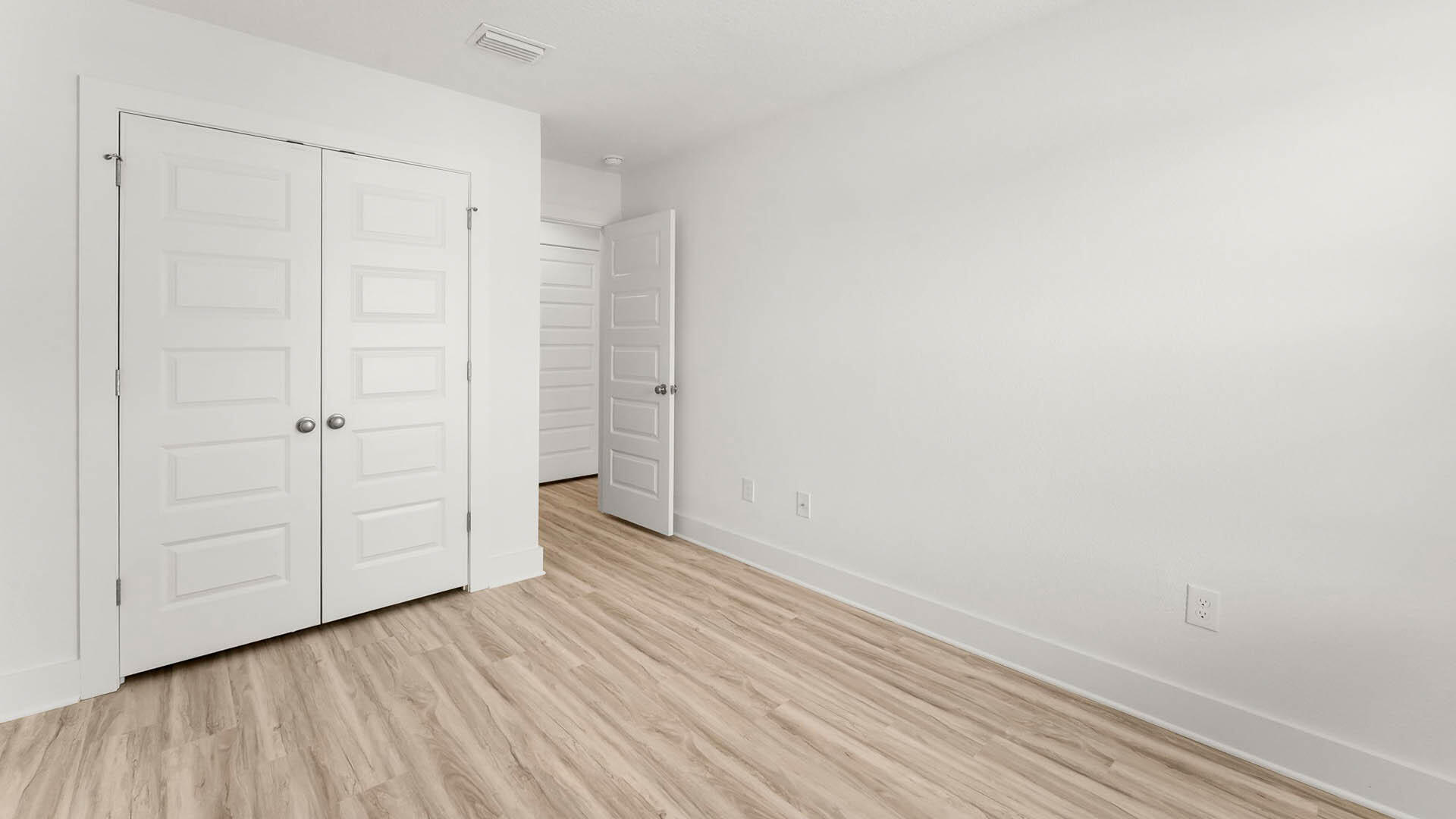 137 Hawk Street Santa Rosa Beach, FL 32459 - Photo 24 of 30 a view of an empty room with closet and a window