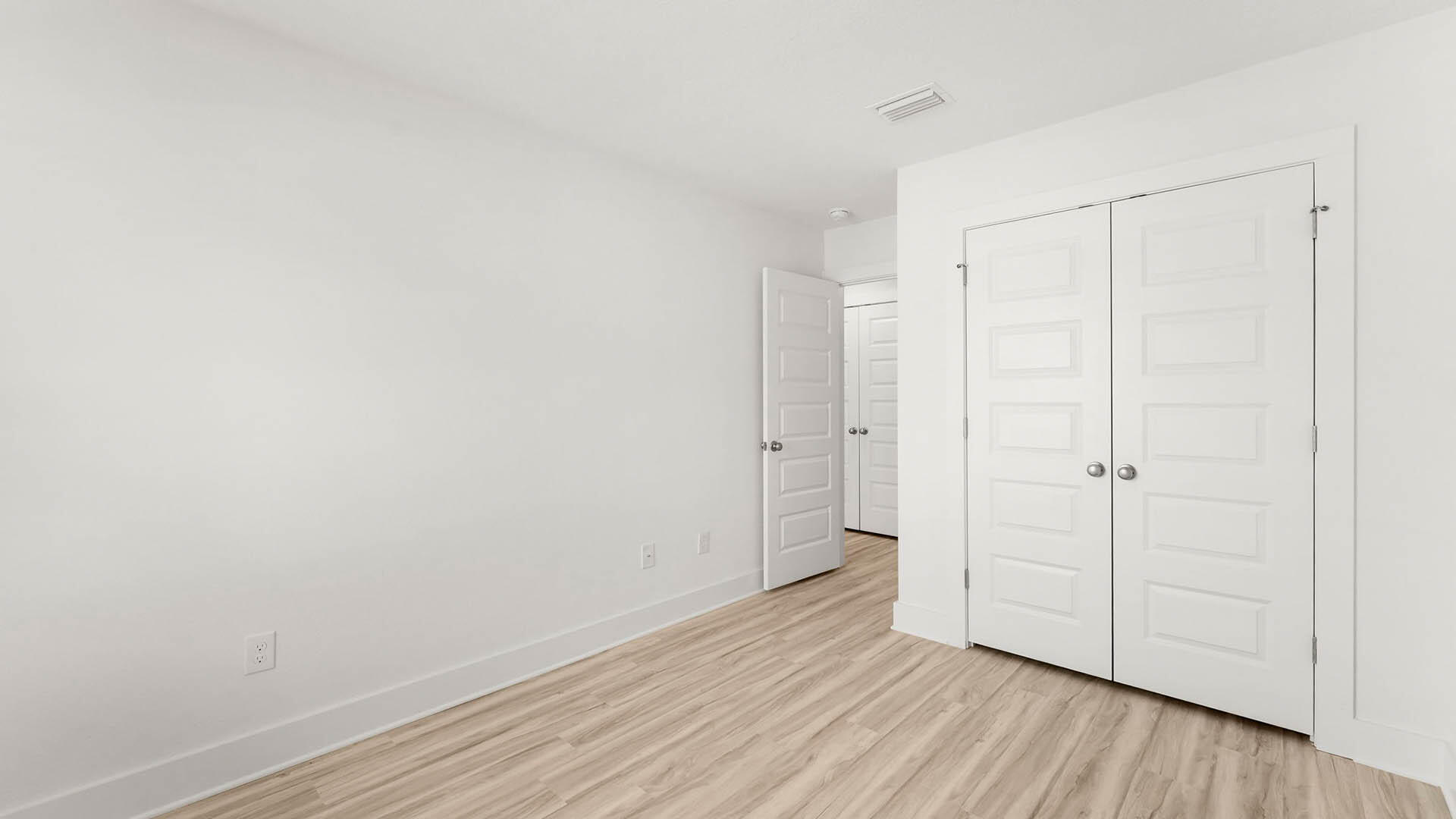 137 Hawk Street Santa Rosa Beach, FL 32459 - Photo 26 of 30 a view of a room with wooden floor