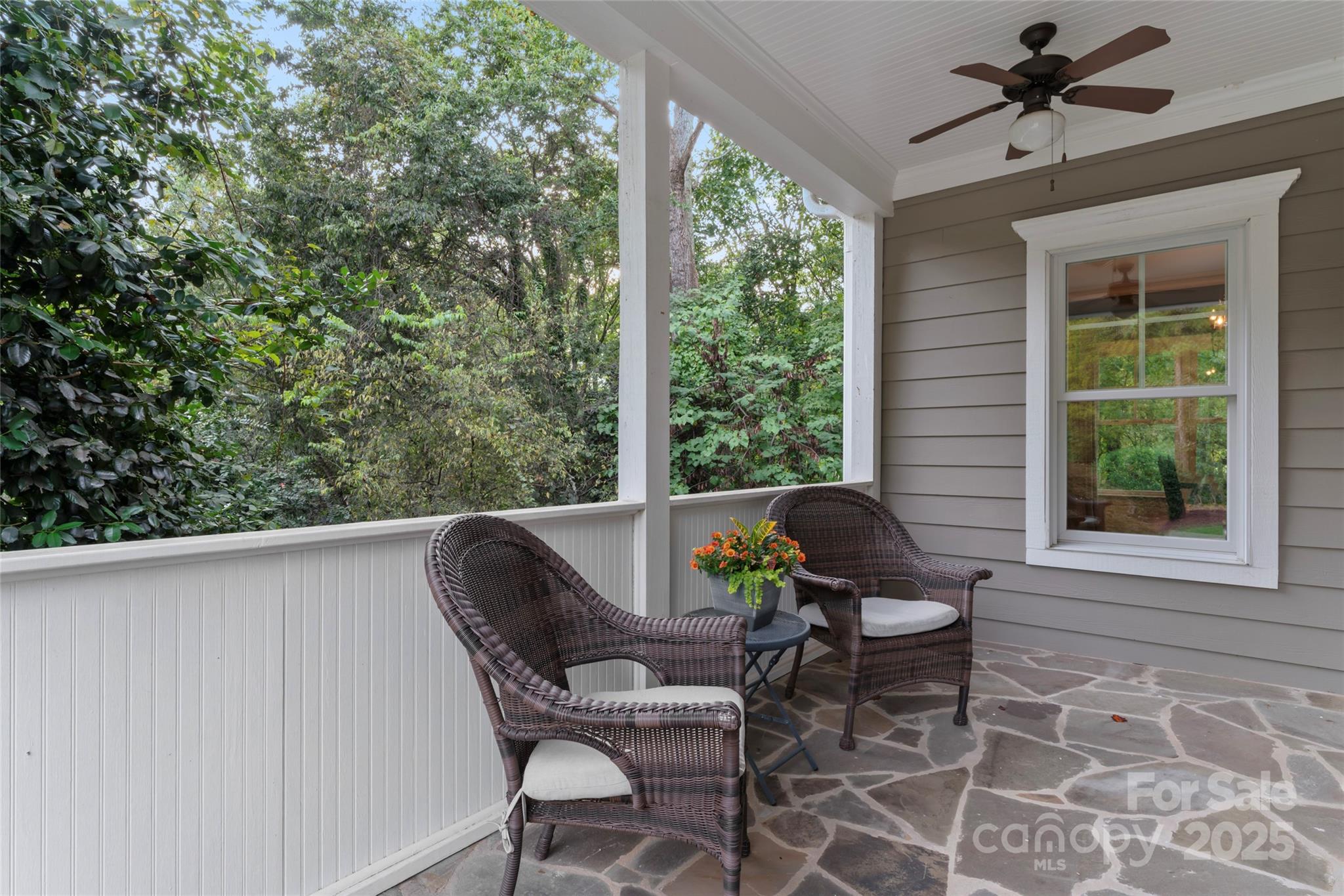 235 Grey Road Davidson, NC 28036 - Photo 13 of 37 a view of a porch with furniture and a yard