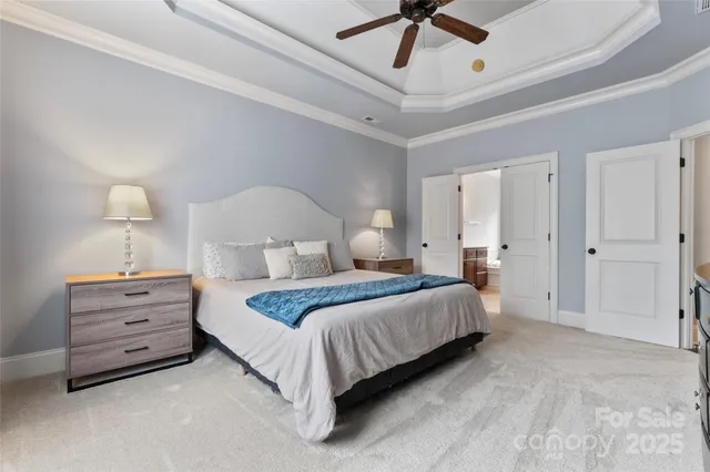 a bedroom with bed and window