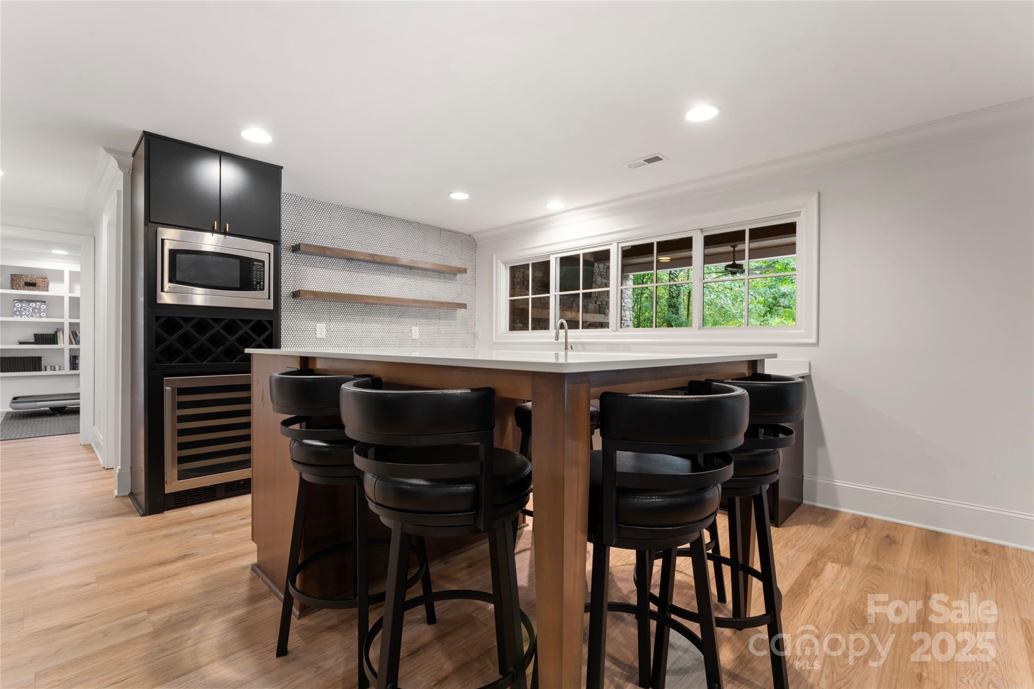 235 Grey Road Davidson, NC 28036 - Photo 29 of 37 a kitchen with a table and chairs in it
