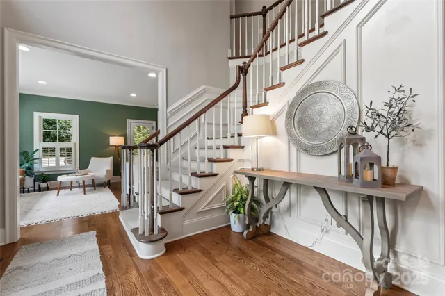 a view of entryway with wooden floor and a rug
