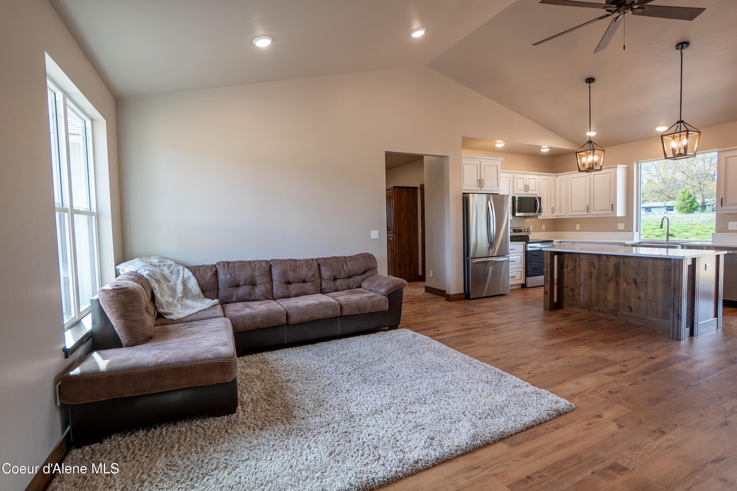 167 Airstrip Road Moyie Springs, ID 83845 - Photo 8 of 27 Living to Kitchen