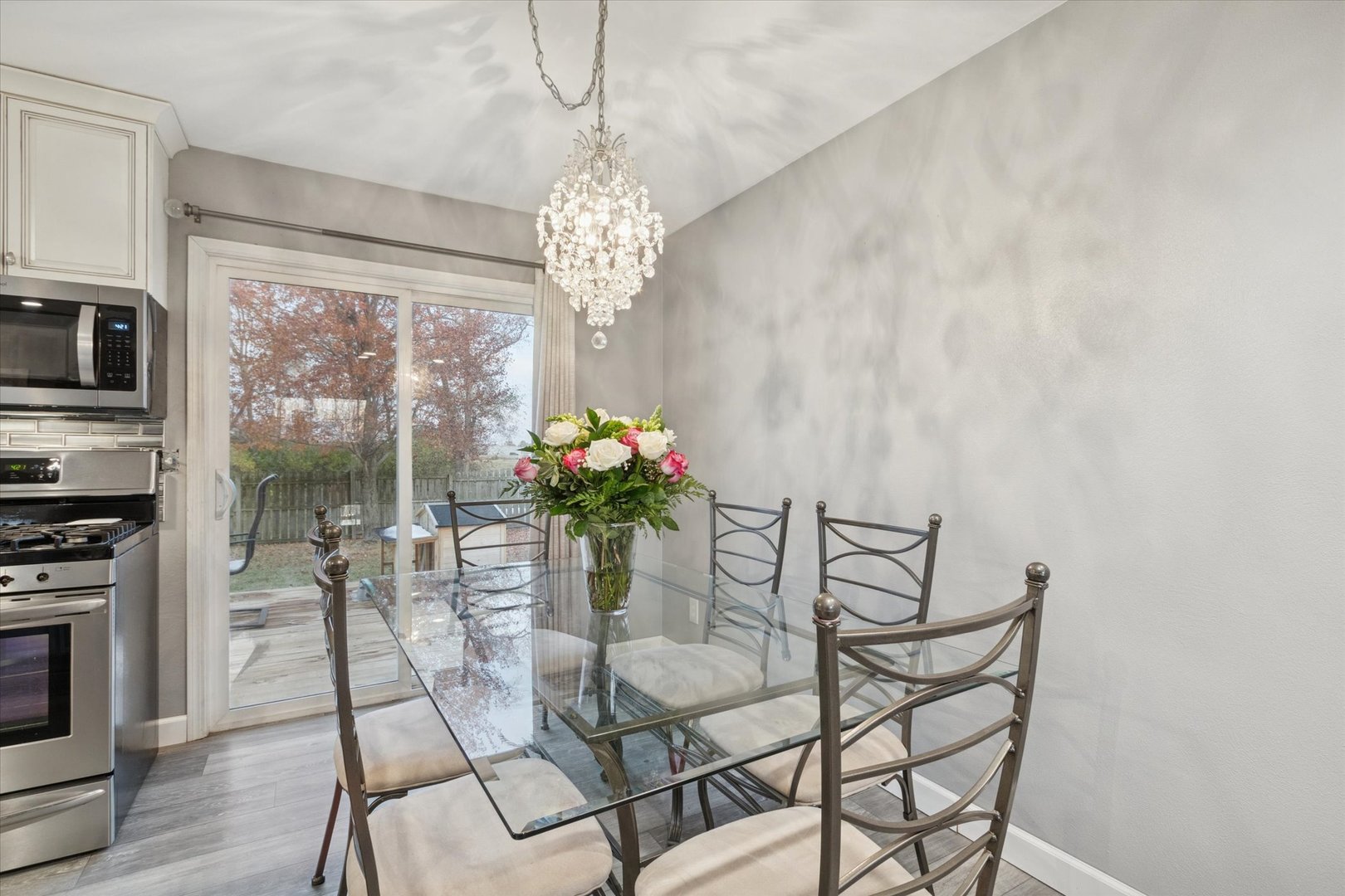 549 Bayfield Road Rockton, IL 61073 - Photo 12 of 42 a dining room with furniture a livingroom and chandelier