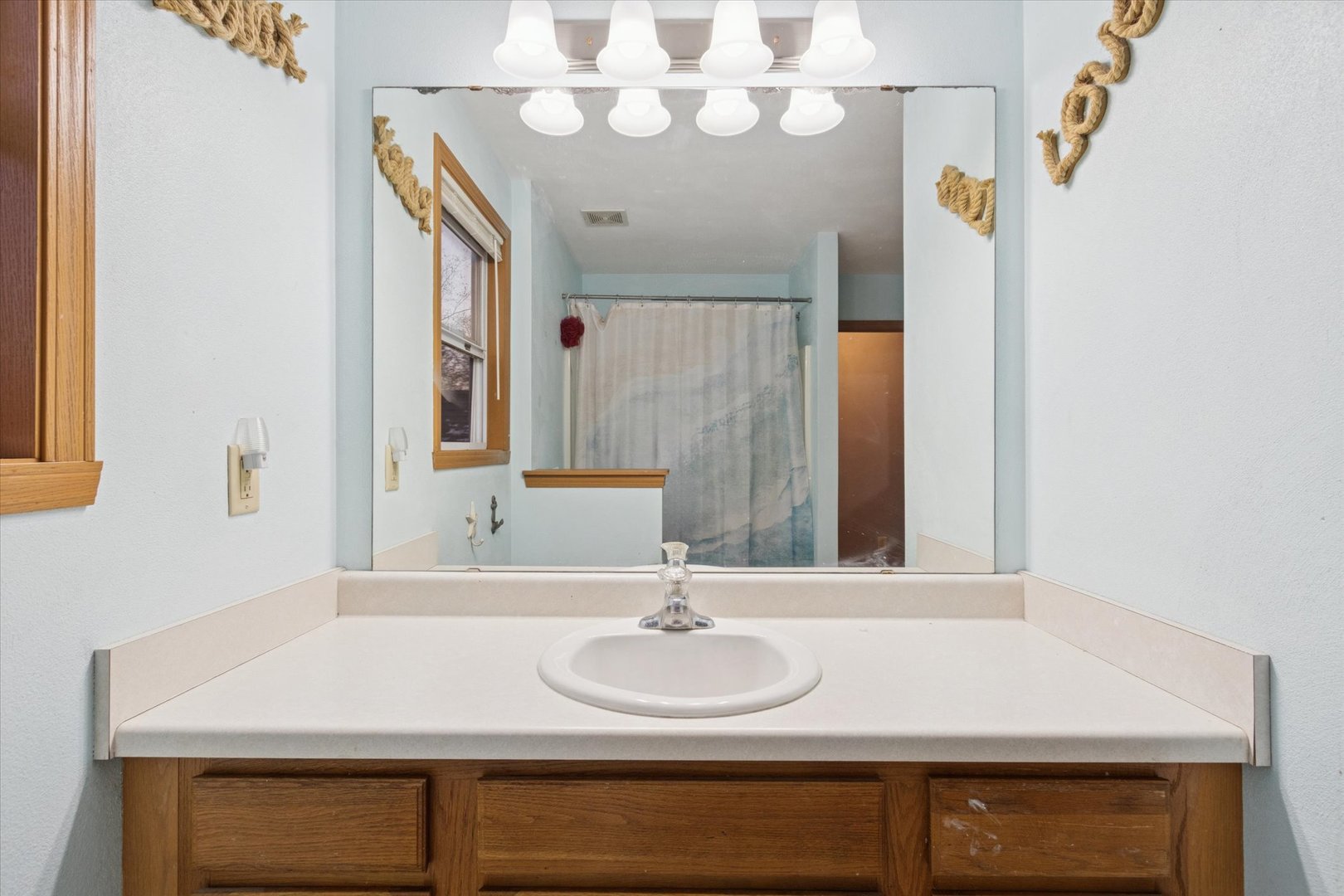 549 Bayfield Road Rockton, IL 61073 - Photo 27 of 42 a bathroom with a sink and a mirror