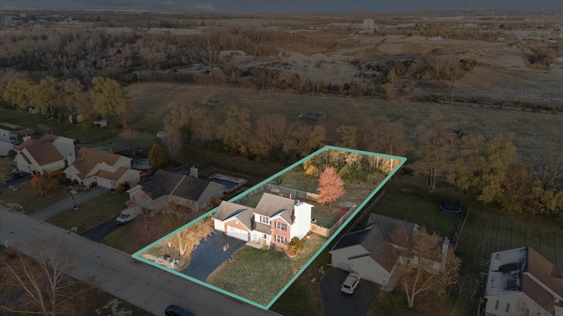 549 Bayfield Road Rockton, IL 61073 - Photo 42 of 42 an aerial view of a house with a yard