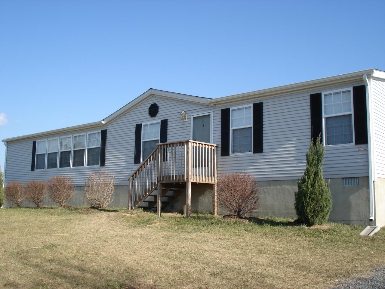 2015 Lick Ridge Road Northeast Check, VA 24072 - Photo 1 of 10 a front view of a house with a garage